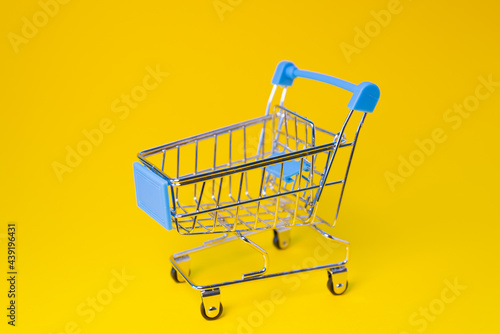 Empty cart for groceries and goods.