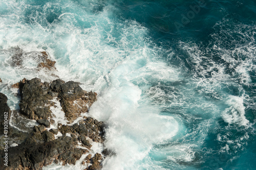 waves breaking on the rocks