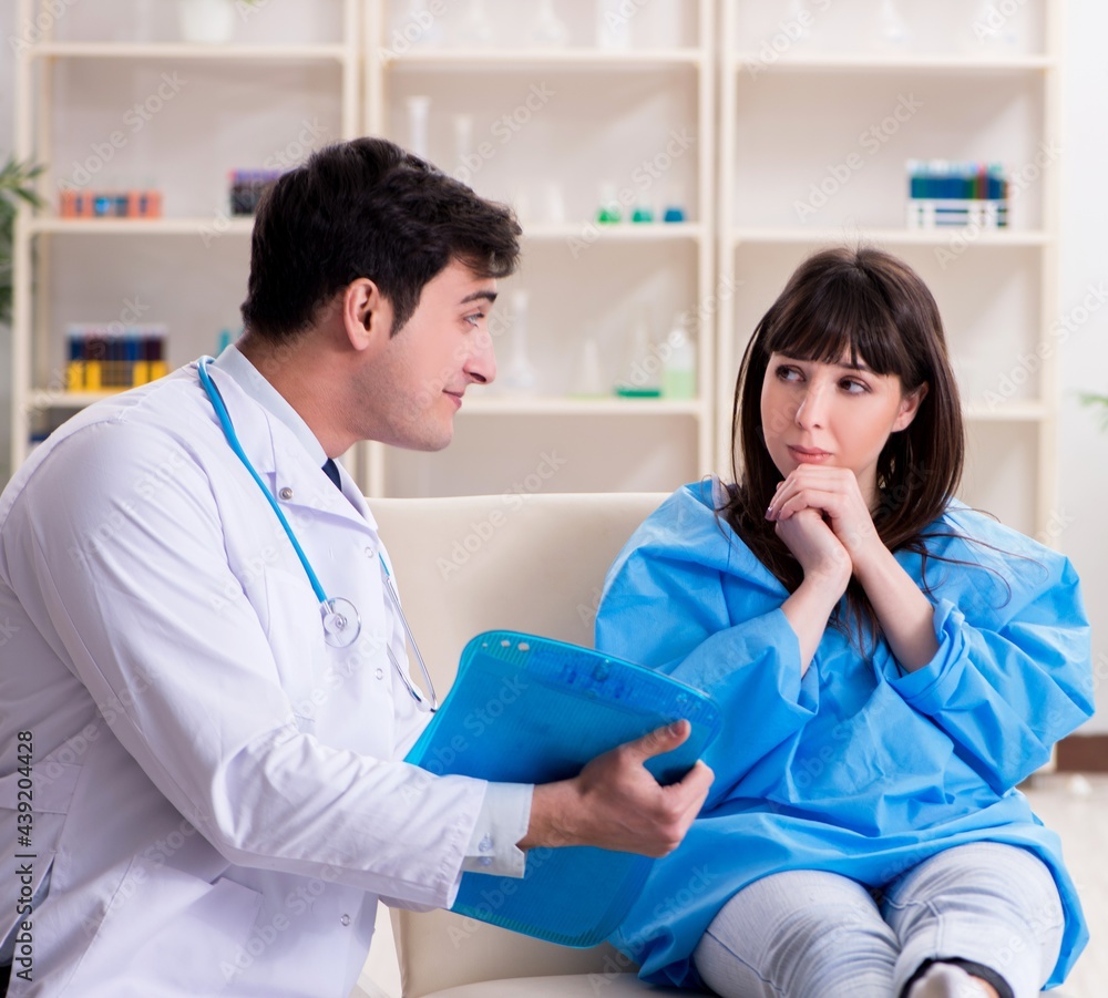 Doctor discussing blood transfusion with patient Doctor discussing blood transfusion with patient