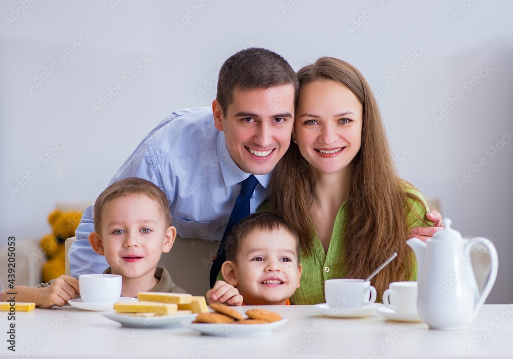 Happy family having breakfast together at home Happy family having breakfast together at home