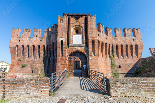 Soncino, Italy - 2021, June 13: exterior view of Castello Visconteo in Soncino, ITaly. No people are visible, shot is taken during a bright and sunny summer day. photo