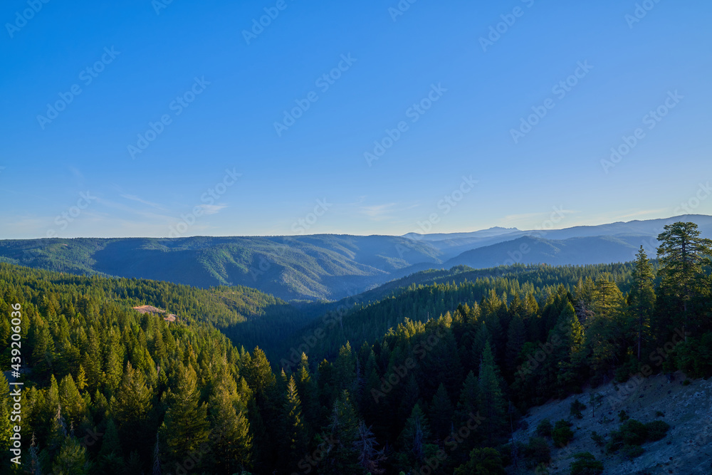Scenic View of Northern California Mountains in the early morning with blue skies 