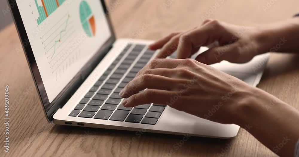 Work with stats using business software for financial data analysis, sales result, forecasting concept. Computer screen with graphs, diagrams, charts, female hands texting on laptop keyboard, close up Work with stats using business software for financial data analysis, sales result, forecasting concept. Computer screen with graphs, diagrams, charts, female hands texting on laptop keyboard, close up