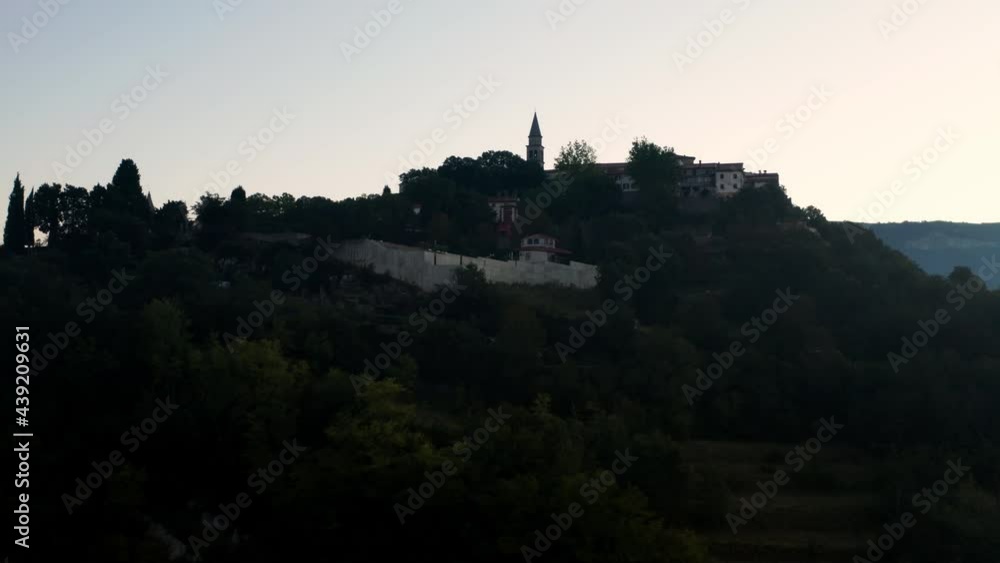 Silhouetted Townscape On Hilltop With Parish Church At Stari Grad Buzet During Dawn In Istria, Croatia. - Aerial Drone Shot Silhouetted Townscape On Hilltop With Parish Church At Stari Grad Buzet During Dawn In Istria, Croatia. - Aerial Drone Shot