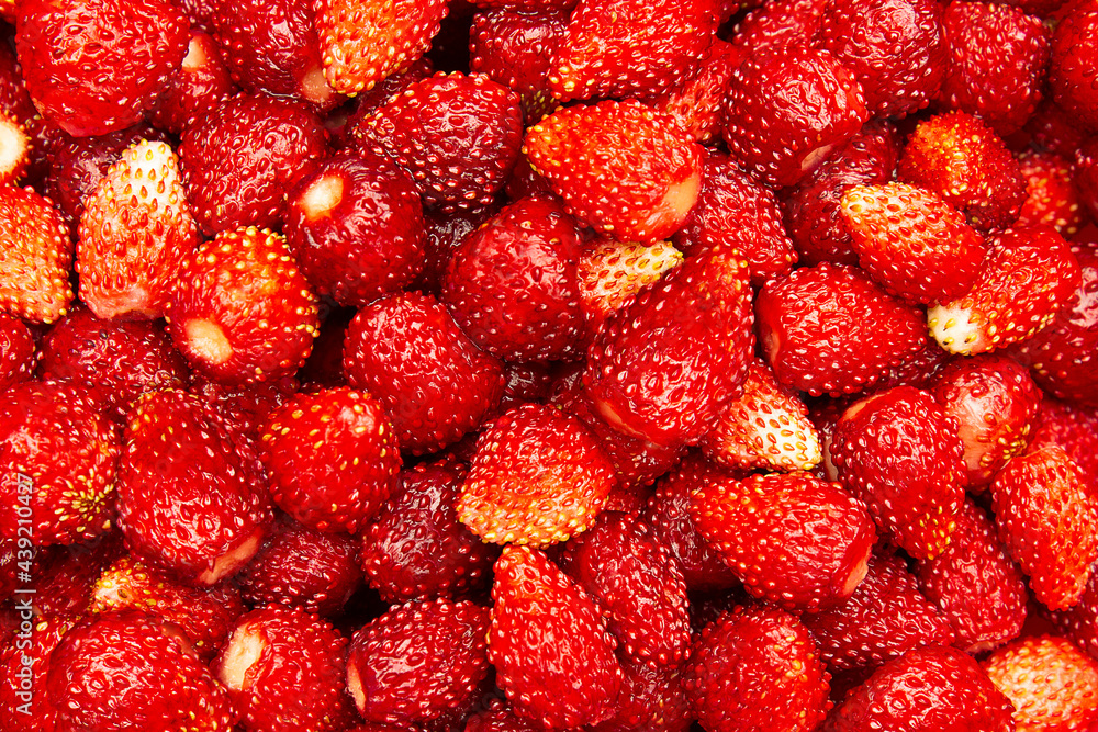 Fresh wild strawberry close-up, fruit background, top view. Summer food, delicious meal, copy space. Fresh wild strawberry close-up, fruit background, top view. Summer food, delicious meal, copy space.