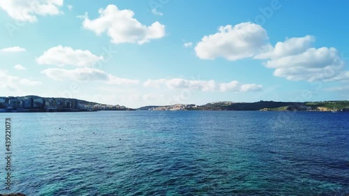 Timelapse video from Malta, Bugibba with the bay and sea view and surrounding towns in the background. photo