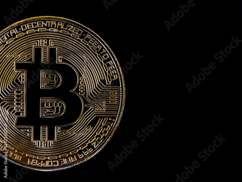 Bitcoin technology dark background. Close-up golden bitcoin on black background with copy space, cryptocurrency investment concept. Digital future coin currency financial background.