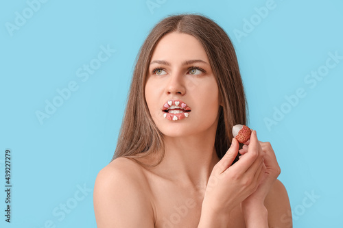 Beautiful young woman with ...