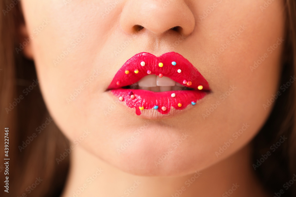 Obraz premium Beautiful young woman with creative makeup, closeup