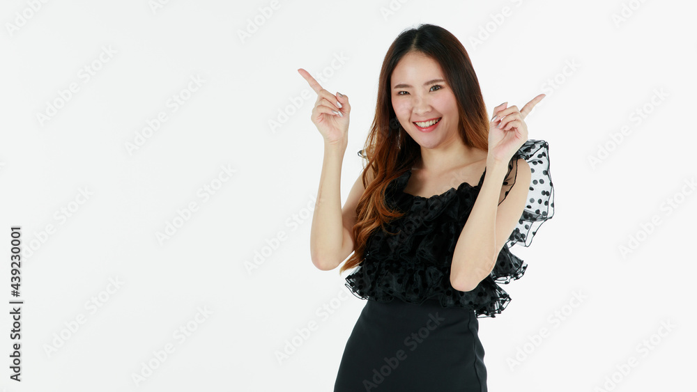 Portrait of young and cute self-confidence brunette long hair Asian girl with smile and friendly face. Charming girl pose with happy studio shot isolated on white background with finger pointing Portrait of young and cute self-confidence brunette long hair Asian girl with smile and friendly face. Charming girl pose with happy studio shot isolated on white background with finger pointing