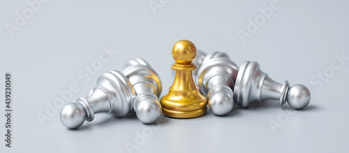 gold Chess pawn figure stand out from crowd of enermy or opponent. Strategy, Success, management, business planning, disruption, win and leadership concept photo