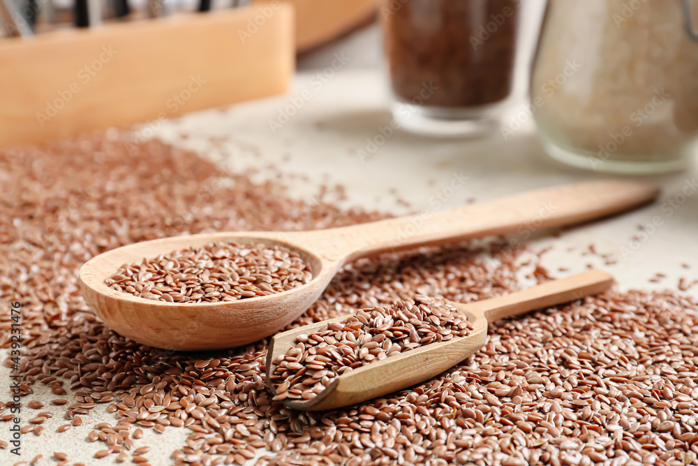 Composition with flax seeds on kitchen table Composition with flax seeds on kitchen table