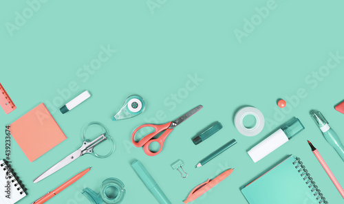 Assorted office and school white orange and green stationery supply on pastel trendy background as knolling. Copy space. Flat lay for back to school or education and craft concept. photo