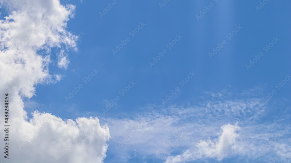 Background of blue sky with white clouds. High quality photo