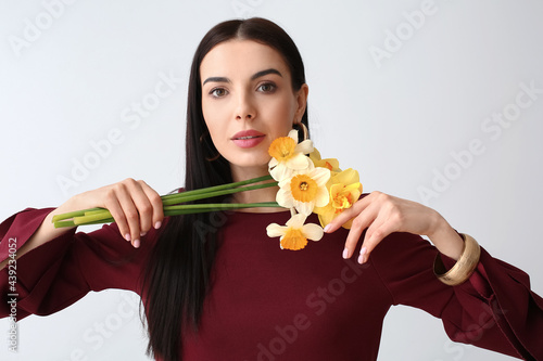 Beautiful young woman with ...