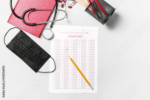Answer sheet, stethoscope, ...