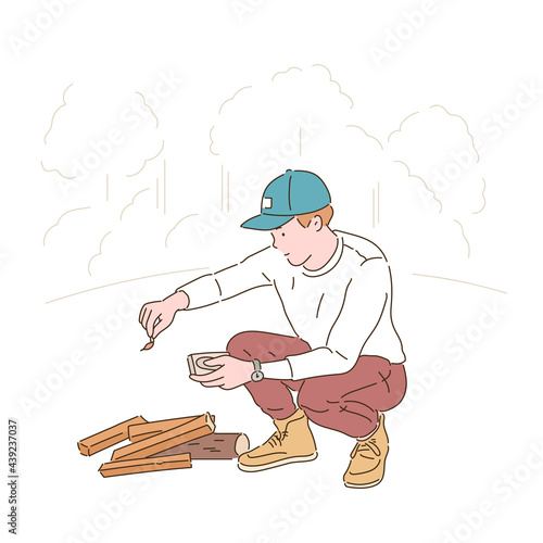 A man is lighting a firewood. hand drawn style vector design illustrations. 