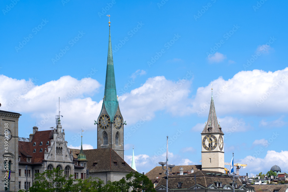 Protestant churches St. Peter and Fraumünster (Womens's Minster) at the old town of Zurich at a beautiful summer day. Photo taken June 13th, 2021, Zurich, Switzerland.