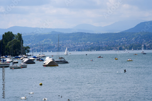 Lake Zurich on a beautiful windy summer day with sailing and motor boats.  Photo taken June 13th, 2021, Zurich, Switzerland. © Michael Derrer Fuchs