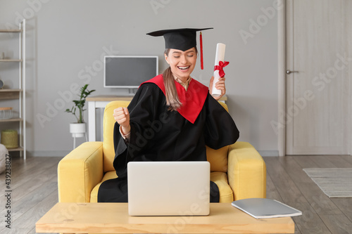 Happy female student on her...