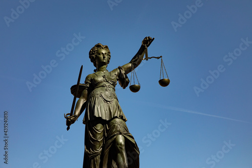lady justice with sword and scale