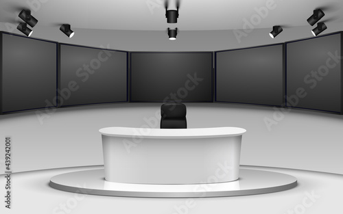 white table and lcd background in a news studio room	
