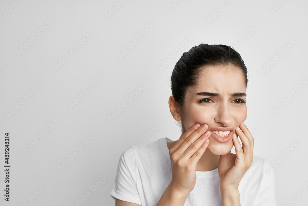 woman holding face health problems toothache dissatisfaction woman holding face health problems toothache dissatisfaction