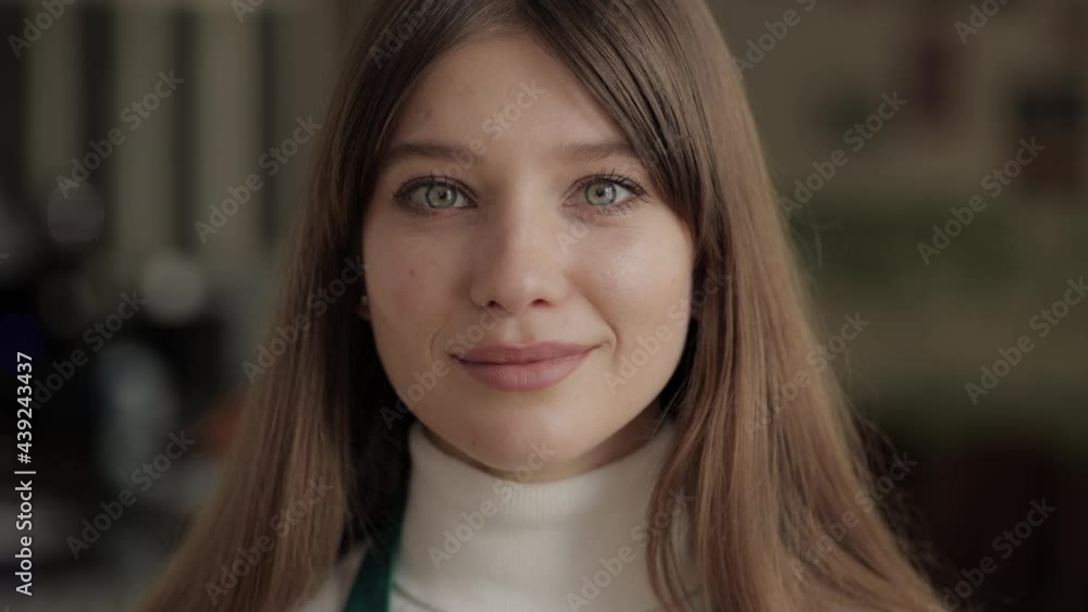 Portrait of young woman with natural beauty at cafe