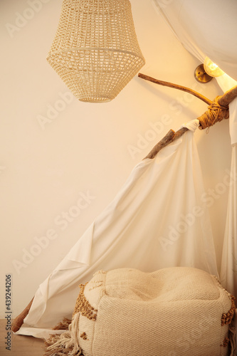 A terapy room subtly decorated with cushions, curtains and lights. photo