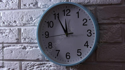 Wallpaper Mural It is five to twelve, the clock is ticking. White Watch shows the time 5 before 12. Close up to a wall clock, with five minutes to twelve o`clock Torontodigital.ca