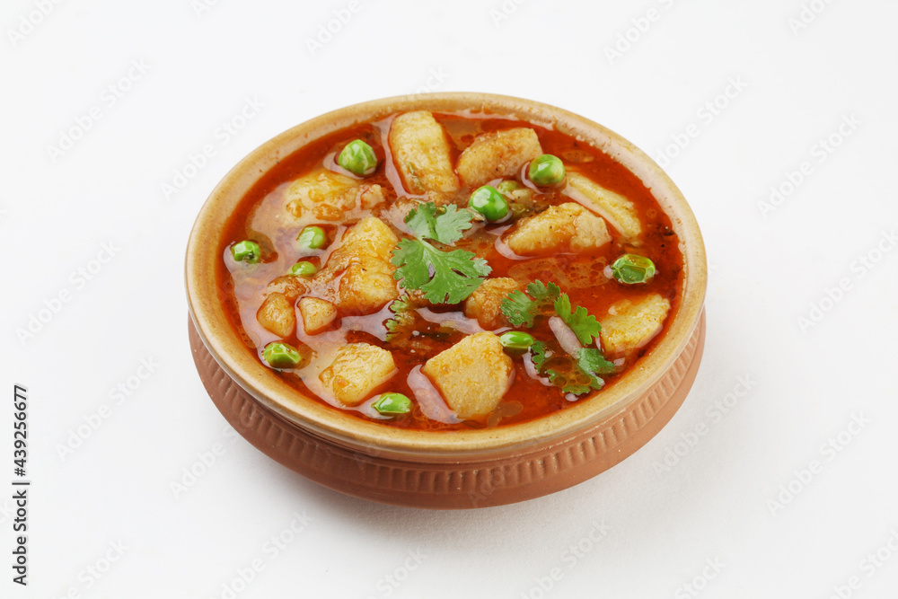 Masala Aloo Sabzi or Indian potato gravy served with fried puri or Poori
Masala Aloo Sabzi or Indian potato gravy served with fried puri or Poori