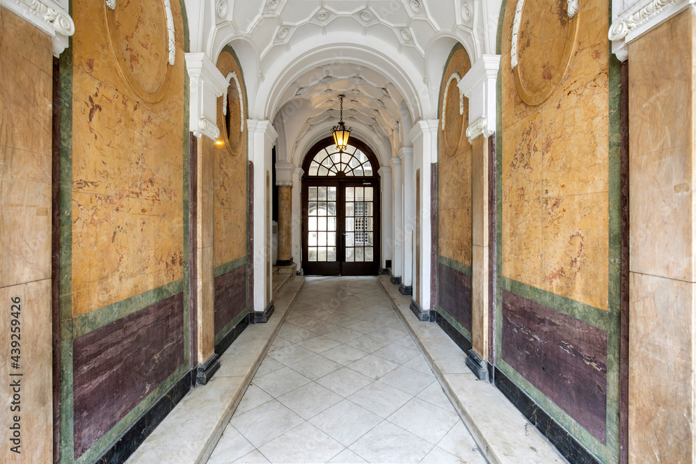 Apartment interior entrance corridor with tiled floor