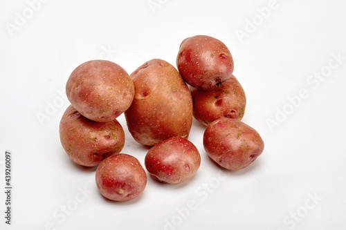 Red potatoes on a white background.
