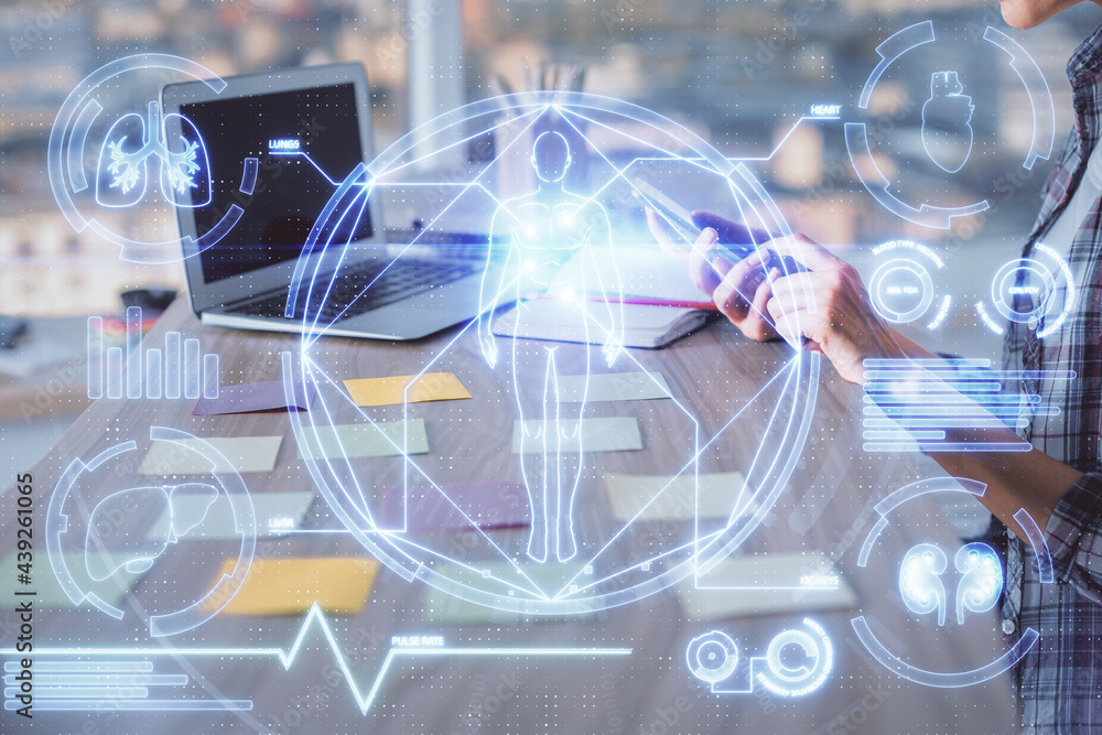 Naklejka premium Double exposure of woman hands typing on computer and general theme hologram drawing. Education concept.