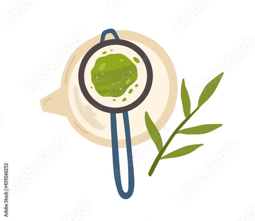 Top view of strainer with matcha powder over teapot. Making Japanese green te...