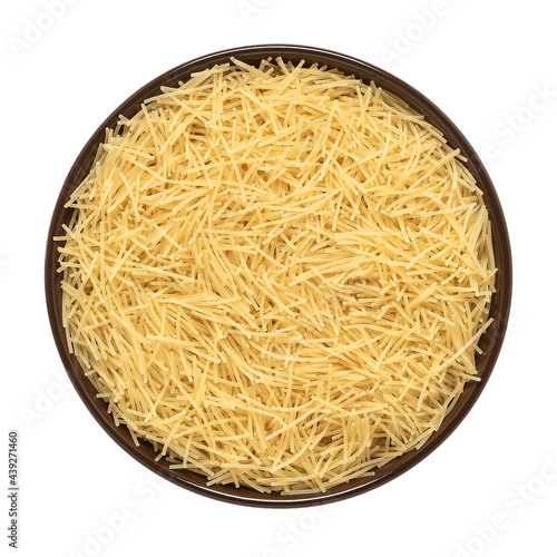 Vermicelli pasta in a bowl isolated on a white background. Top view.