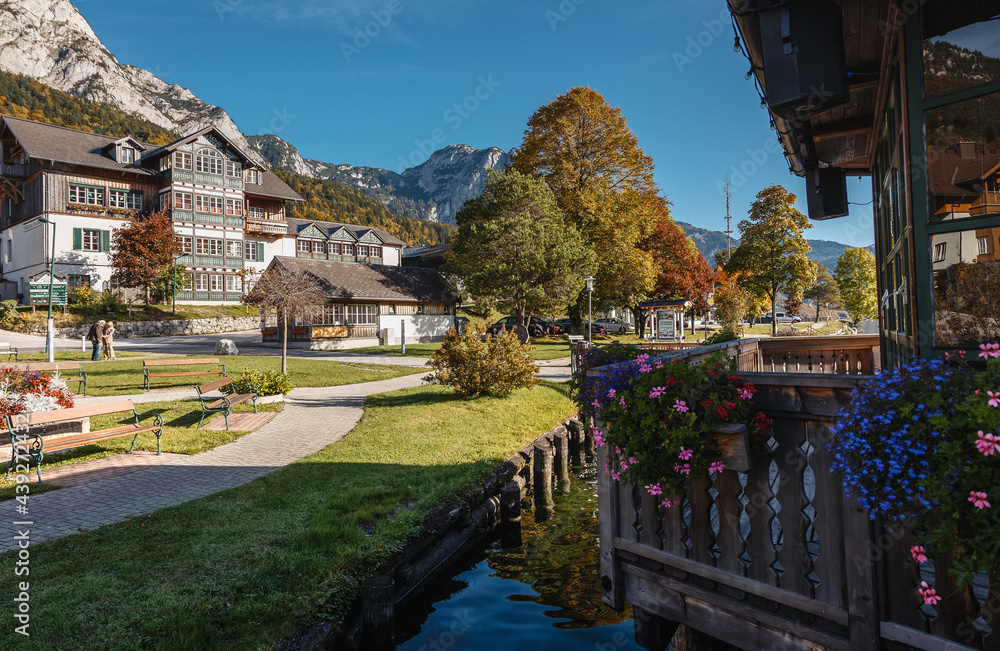Fototapeta premium Amazing countryside scenery in alps at sunny day. Brauhof village on a Grundlsee lake. Austria. Amazing nature landscape. Picture of village park. concept of Travel and holiday on nature.