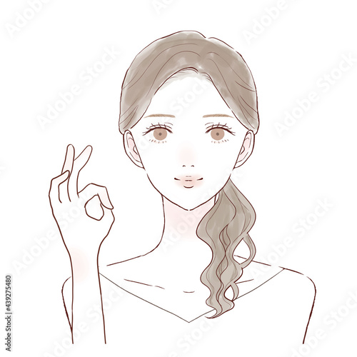 OKサインを出す女性
