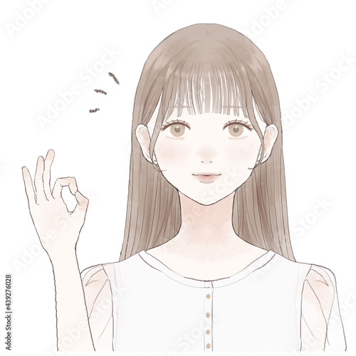 OKサインを出す女性
