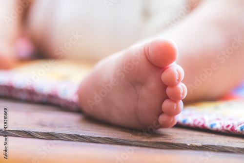 Baby and newborn concept: Close up of newborn baby feet outdoors