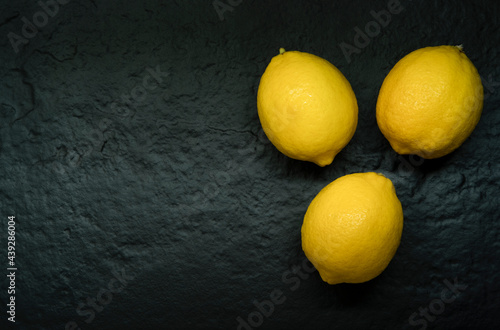 3 ripe yellow lemons