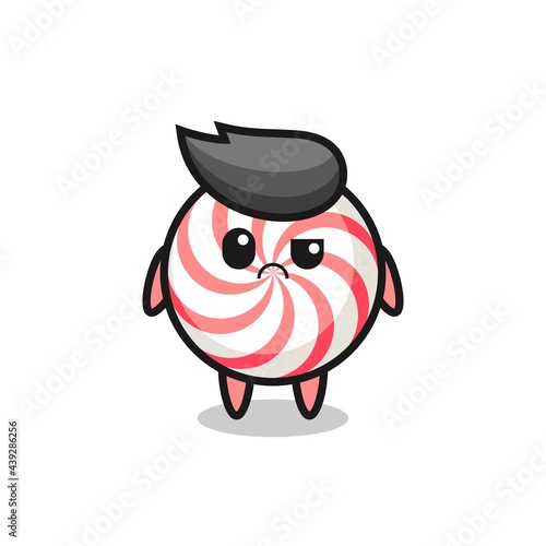 the mascot of the candy with sceptical face