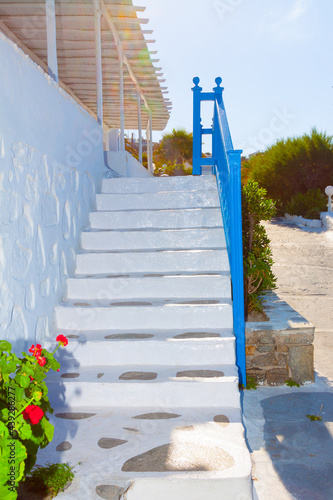 Steps by narrow walkpath in Mykonos Island cyclades greece photo