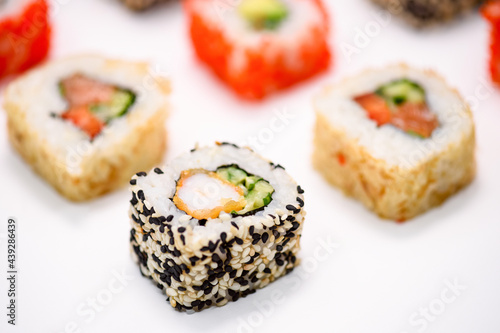 various sushi on white background, close up view