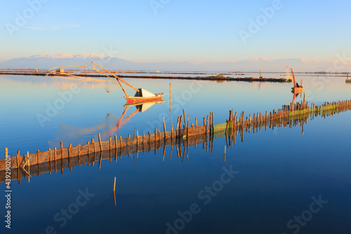 Central Greece,  fishing boats in lake  in Tourlida Greece photo