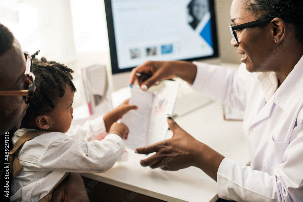 Young patient is getting a diagnose from doctor Young patient is getting a diagnose from doctor