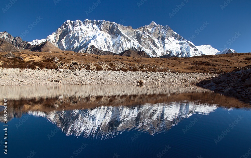 Lhotse Nuptse mirroring lake Nepal Himalaya mountain