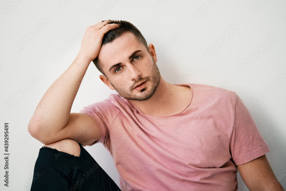 Fashion style portrait of handsome sexy man on white background. Fashion style portrait of handsome sexy man on white background.