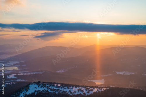 Sun beam on winter lake