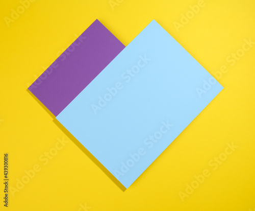modern yellow bright background with sheets of paper with shadow
